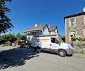 North Wales Roof Repairs company van on site in North Wales